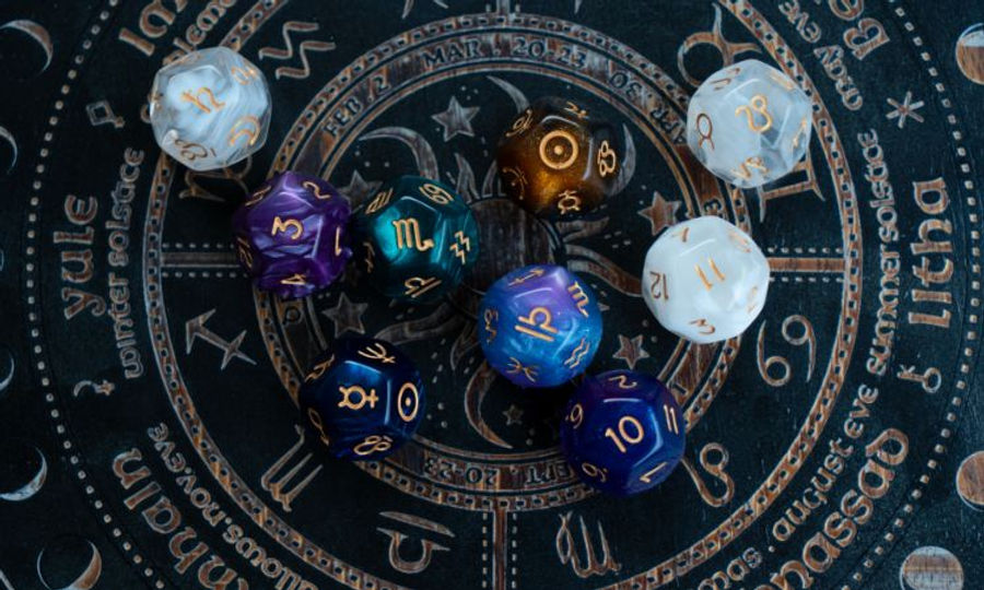 horoscope wheel with crystal dice with numbers and zodiac symbols
